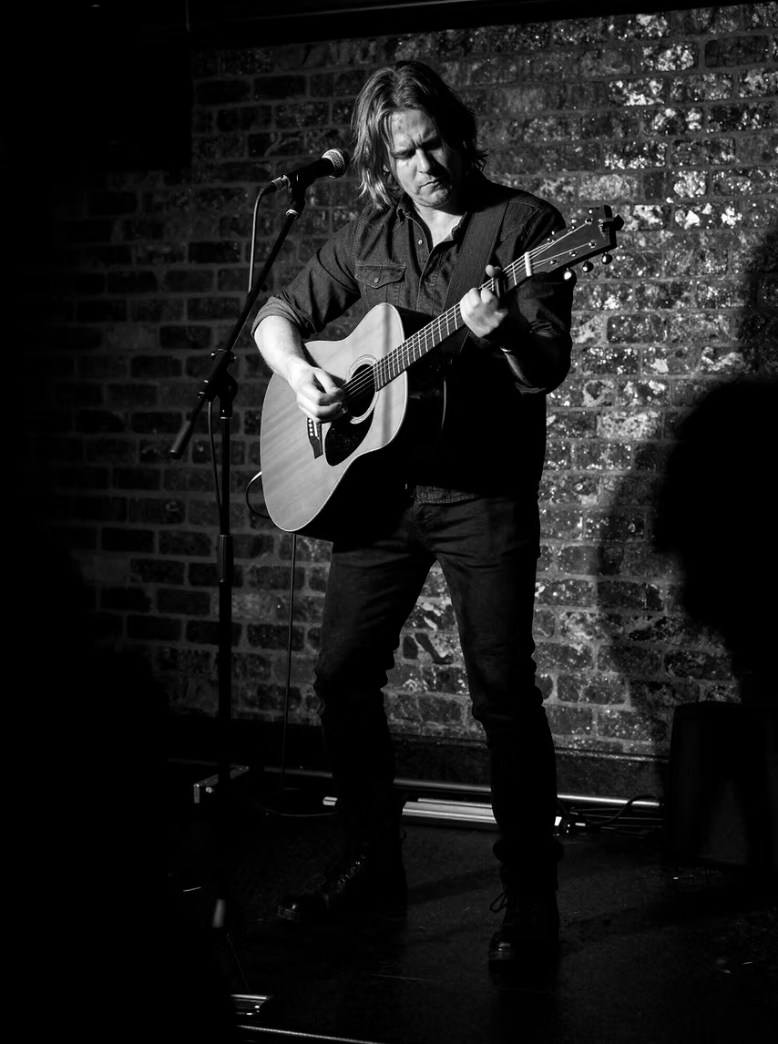 Acoustic artist with guitar